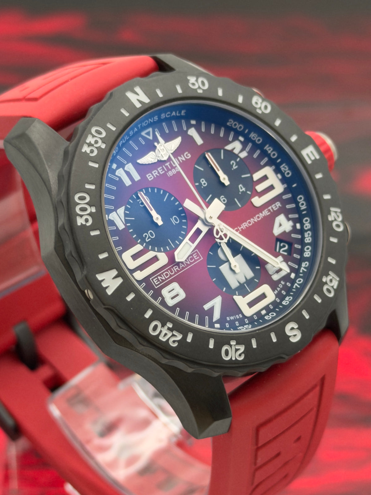 UNWORN 2026 Breitling Endurance Pro IRONMAN® Special Edition Red Dial w/ Red Rubber Strap X82310 -Complete Set - WARRANTY