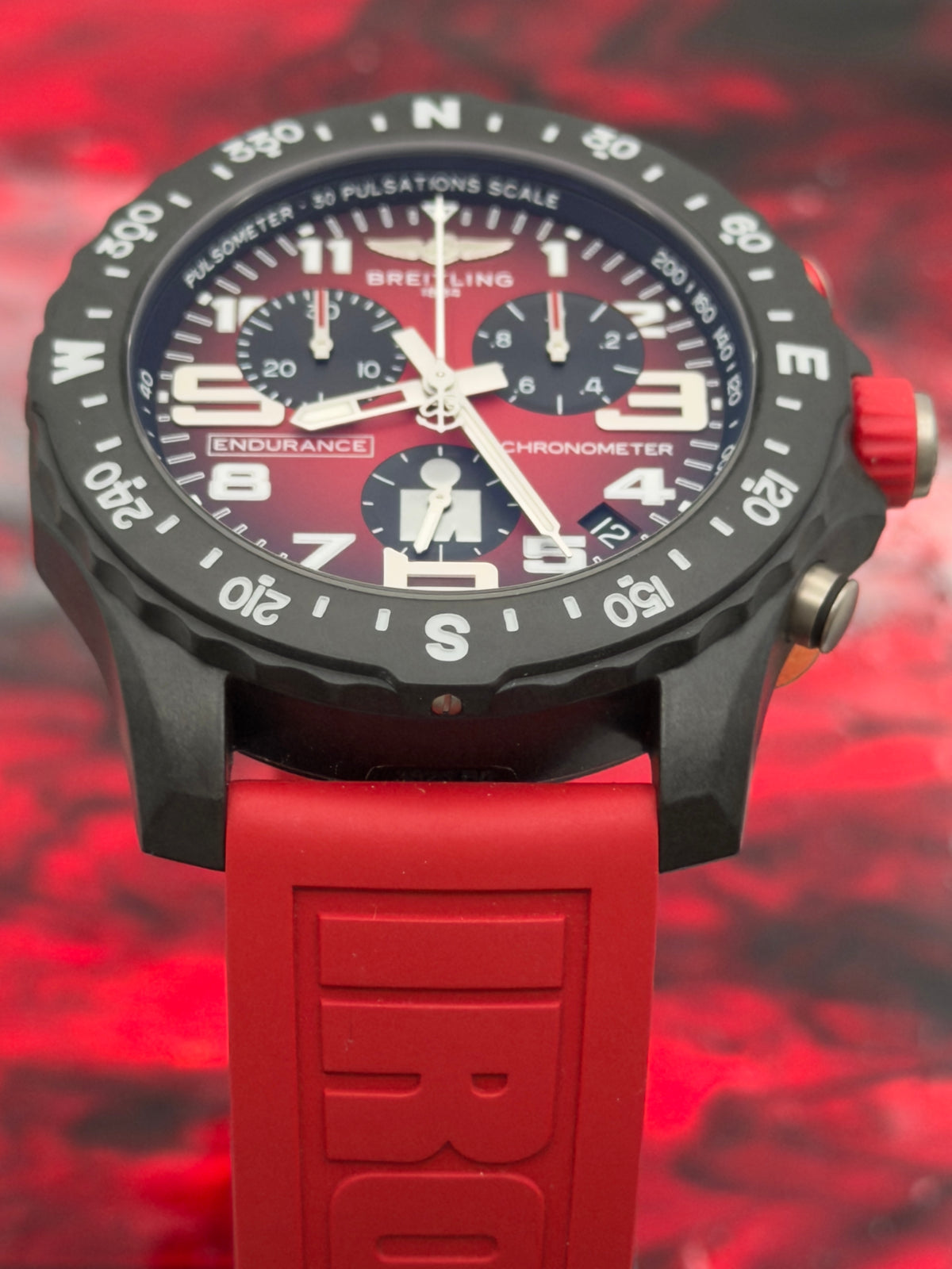 UNWORN 2026 Breitling Endurance Pro IRONMAN® Special Edition Red Dial w/ Red Rubber Strap X82310 -Complete Set - WARRANTY